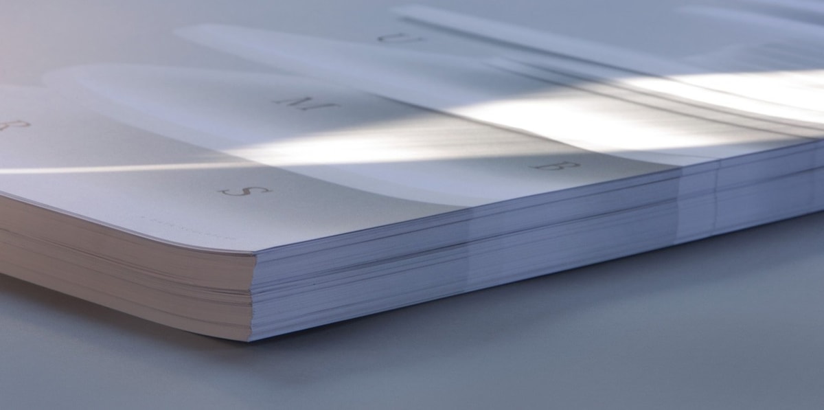 A neat stack of poster designs