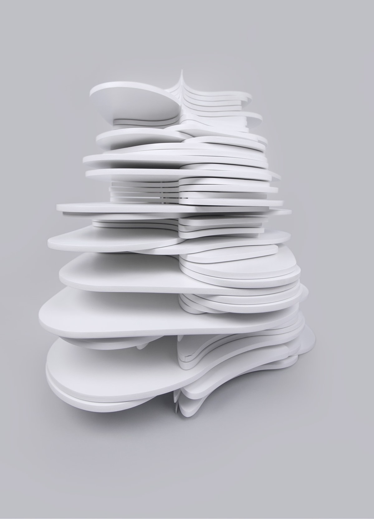 Sculptural work of art, created by stacking irregular planes which communicate company business data