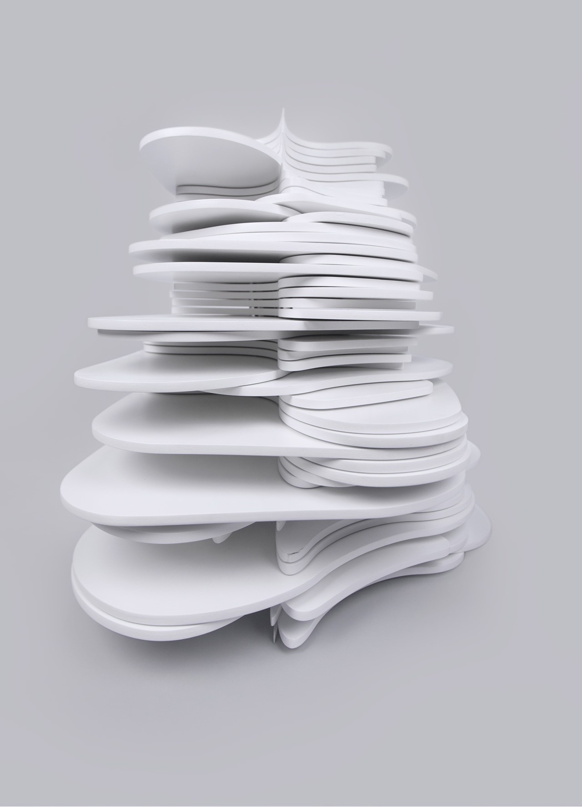 White abstract sculpture made up of stacked layers