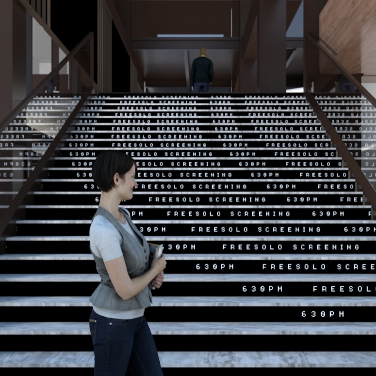 Woman standing in front of staircase with digital letters on risers. 