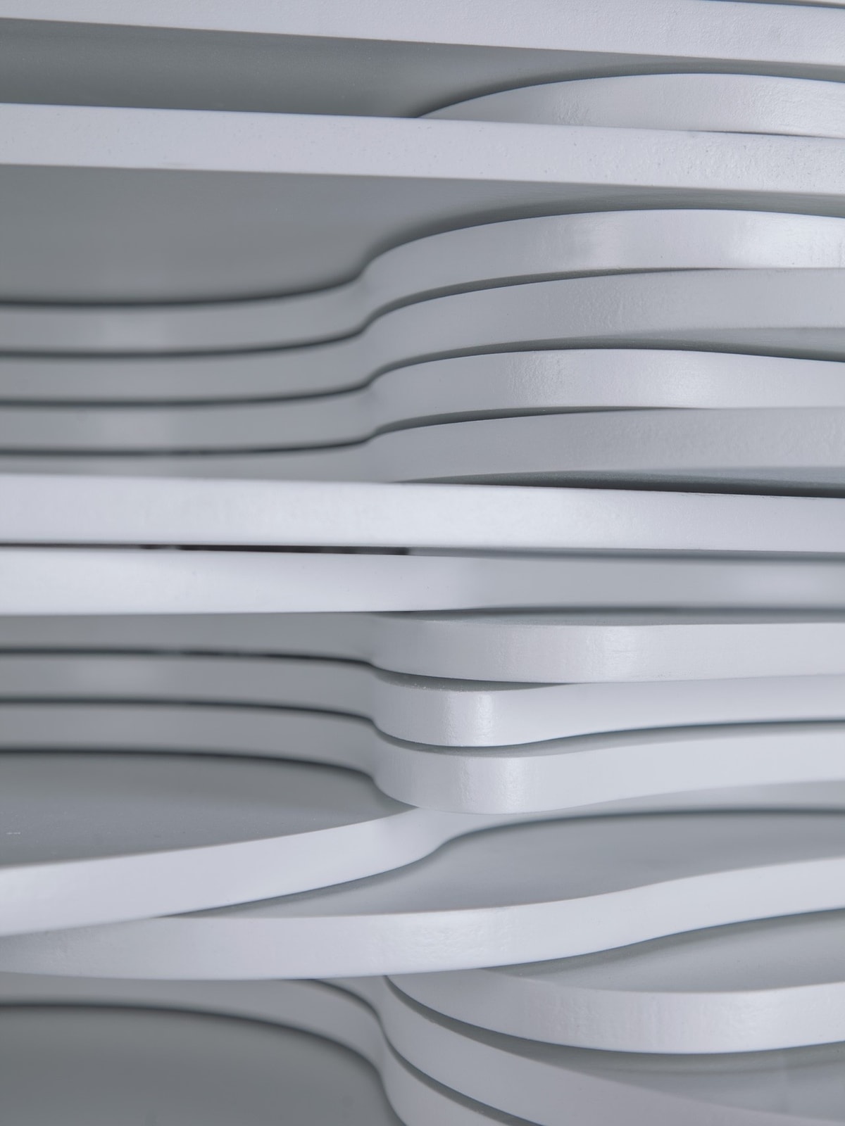 Close-up of sculptural work of art, showcasing irregular layered pieces that contribute to the whole