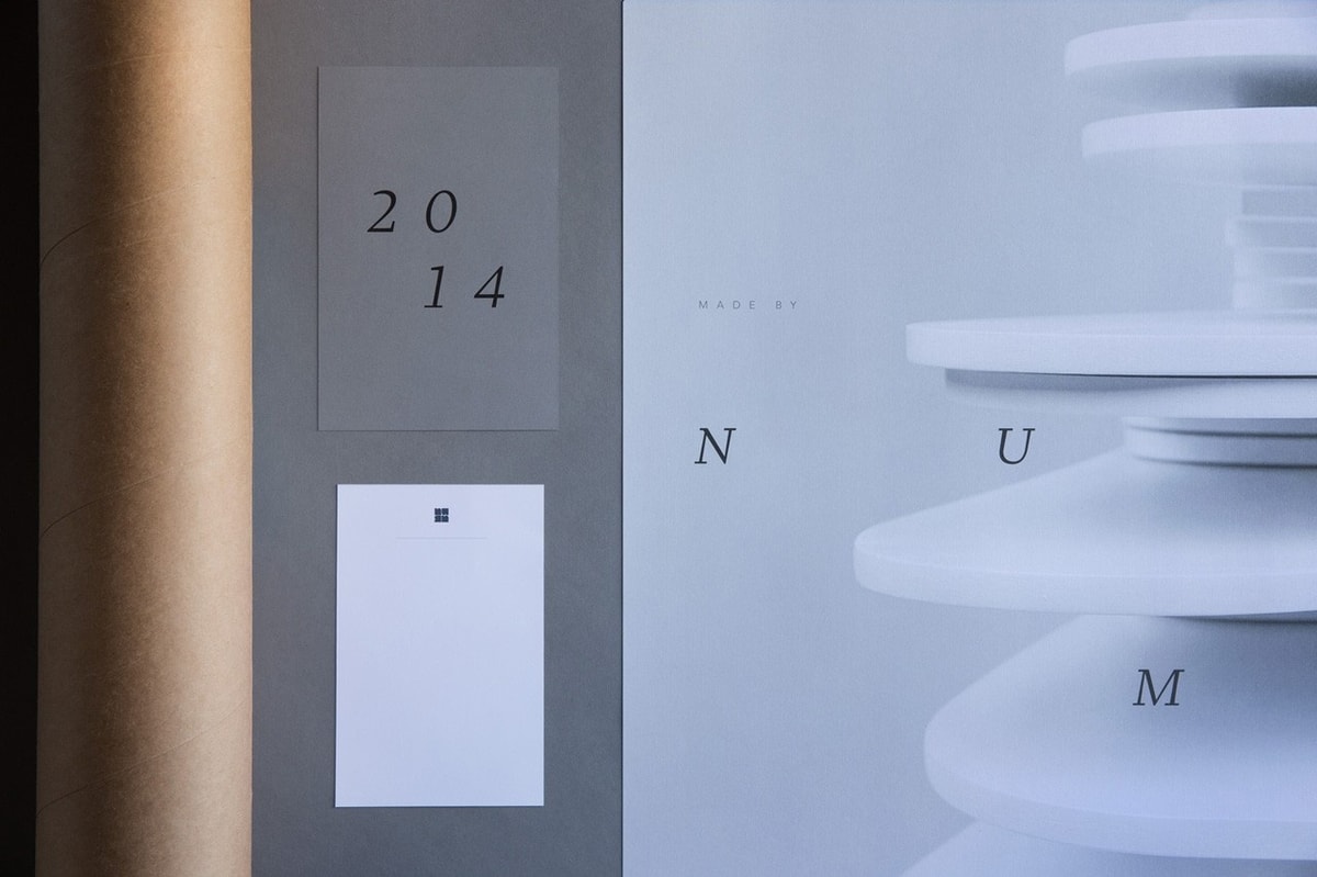 Layout of poster beside two smaller paper designs