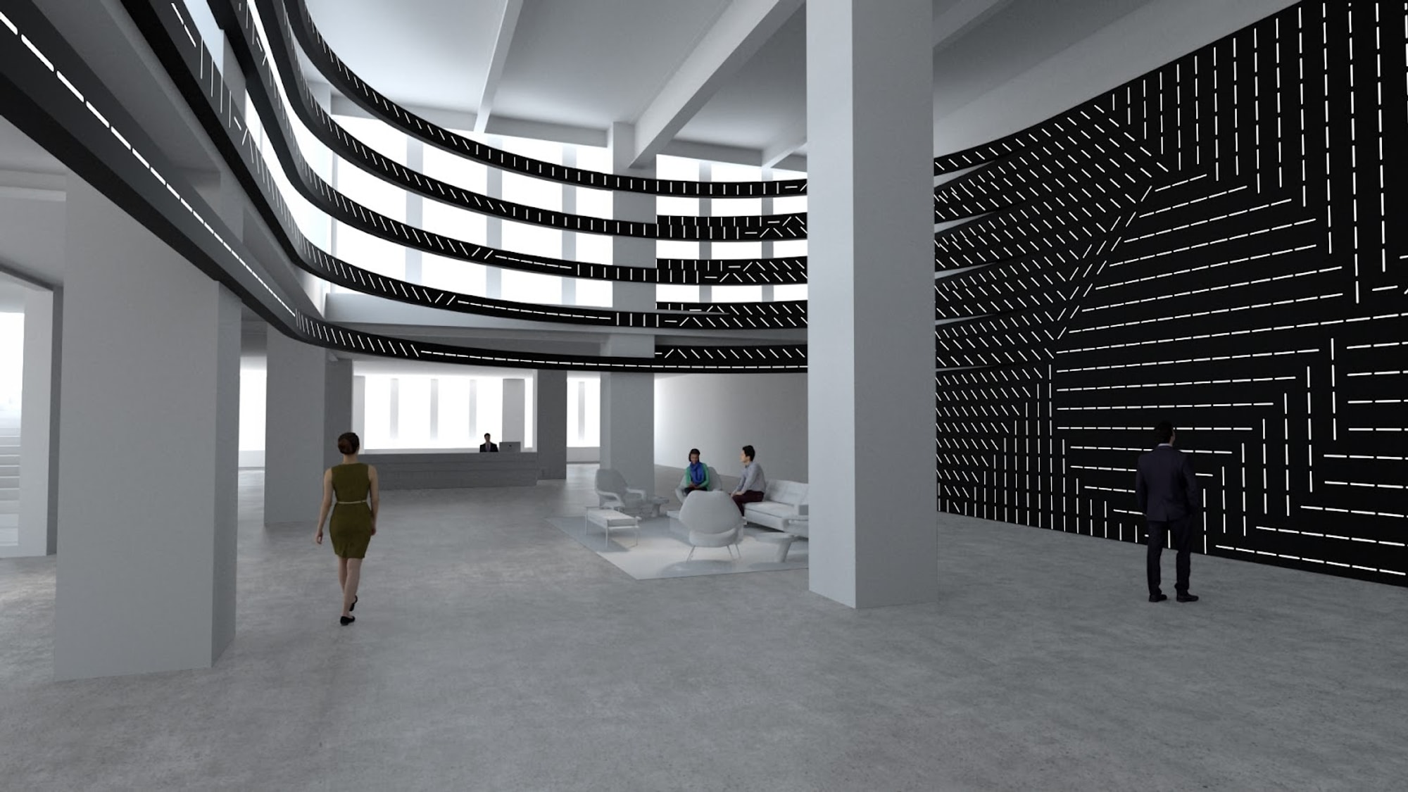 People standing in a double height space with black and white content moving throughout